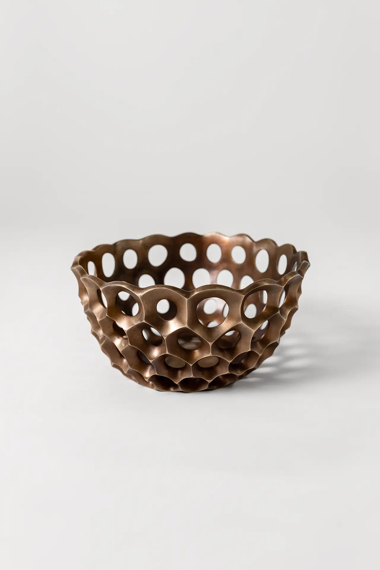 Artistic bronze sculpture titled Rippling Network – modern design
