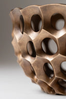 Detailed view of Rippling Network bronze art sculpture