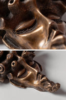 Detailed view of The Dreamer bronze wall-mounted mask