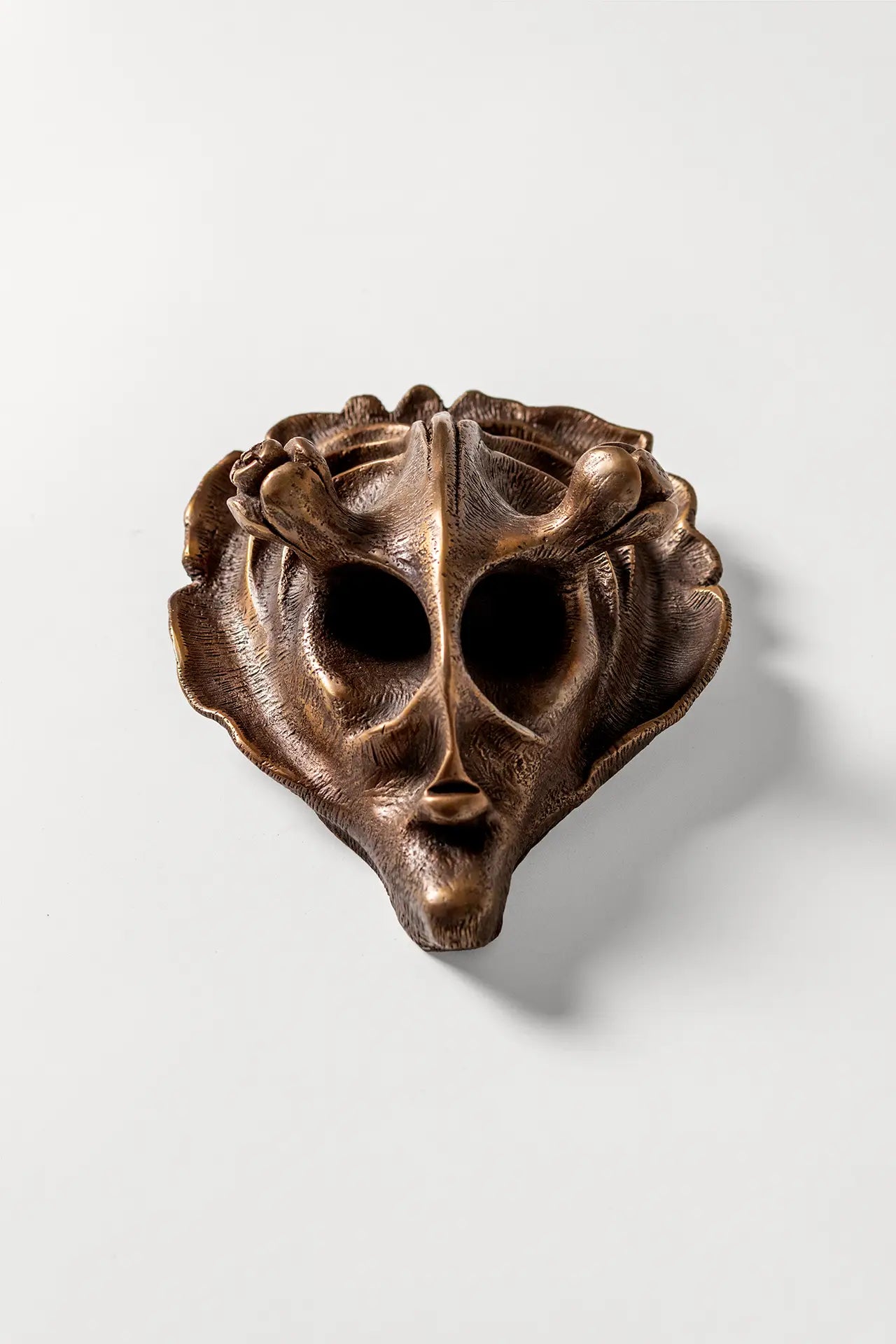Bronze art mask titled The Symbiont – limited edition sculpture
