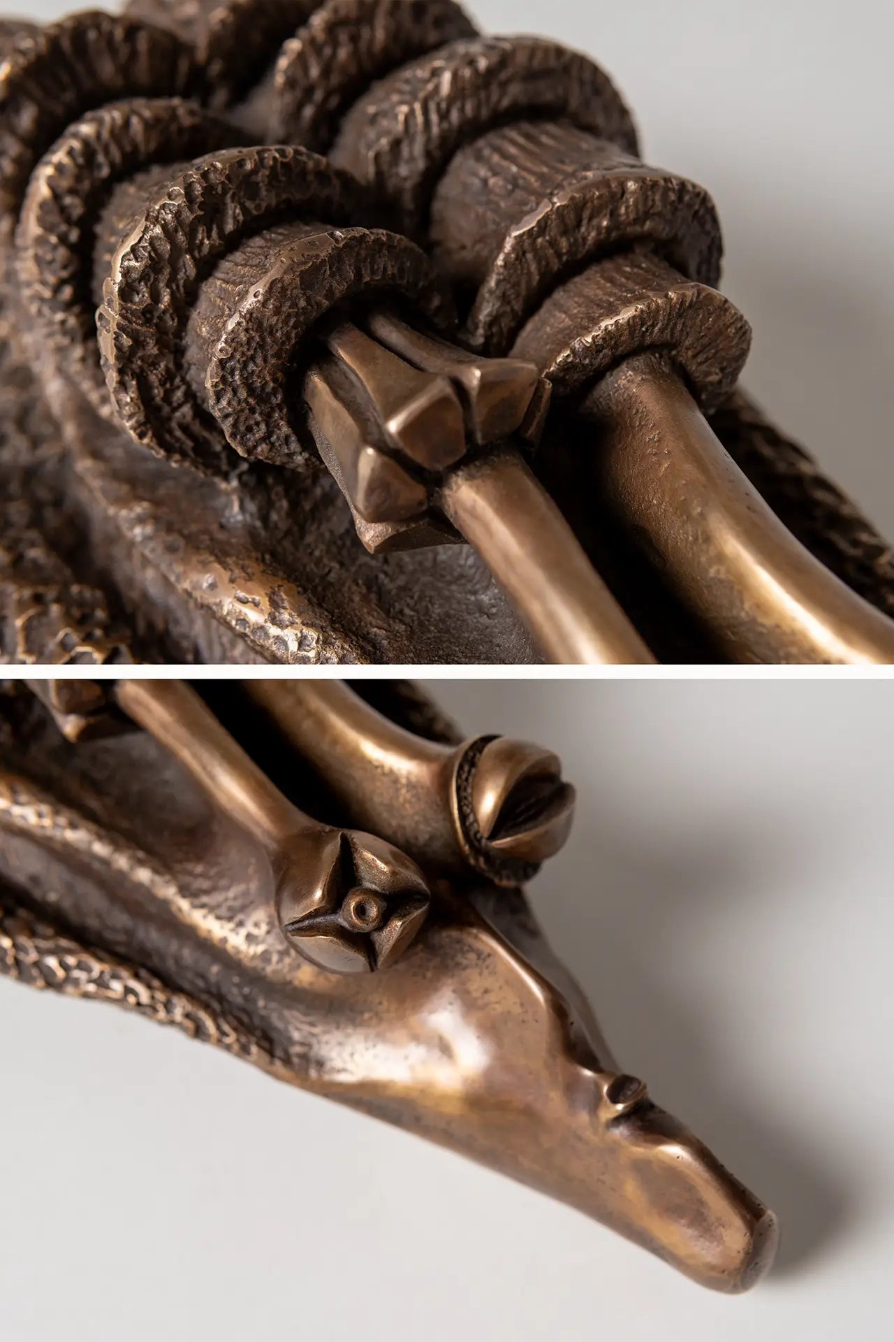 The Wiseman sculpture – thoughtful bronze mask artwork