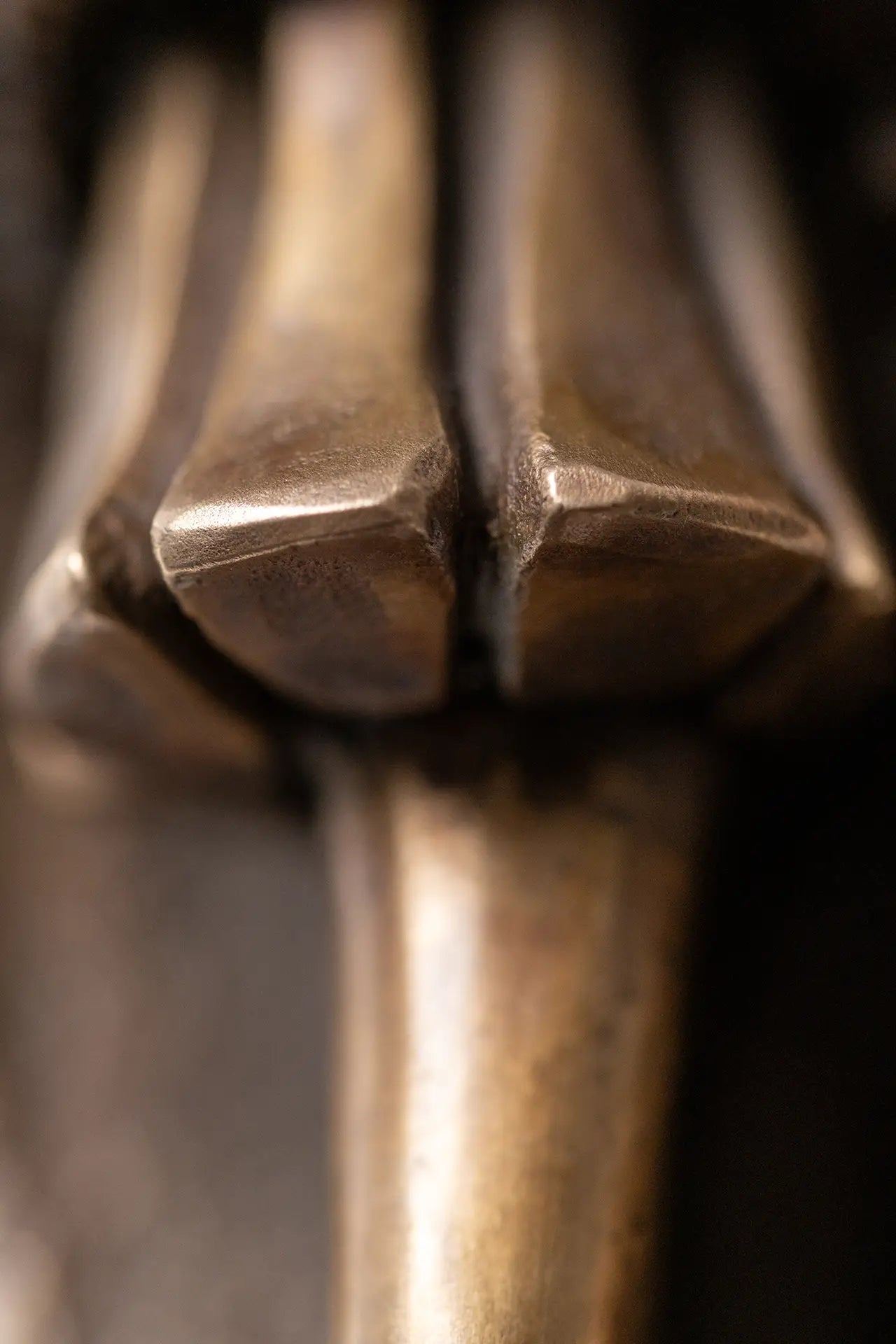 The Wiseman bronze artwork – symbolic mask design